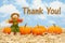 Thank You message with scarecrow and orange pumpkins on straw hay