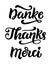 Thank you phrase, hand written lettering in german, english and french