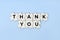 Thank you phrase on wooden puzzle