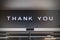 Thank you signage Shop retail display Type on Black wall