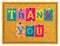 Thank you text from magazine letters pinned to a cork notice board with push pins. Vector.