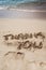 Thank You, text on sand at beach