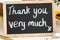 thank you very much message written in chalk on a small blackboard