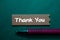 Thank You write on sticky note isolated on Office Desk