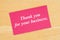 Thank you for your business text on pink card