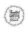 Thankful grateful blessed inspirational design with floral hand drawn wreath and white background