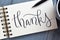 THANKS hand-lettered in notepad