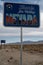 Thanks for Visiting Nevada road sign in desert with mountains