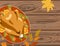 Thanksgiving autumn hand drawn vector with a roasted turkey bird and autumn leaves on a wooden table