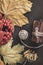 Thanksgiving Autumn red and orange leaf and berry on old wood background. Top view autumn backdrop