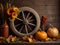 Thanksgiving autumnal still life with old wooden wheel.