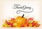 Thanksgiving background with autumn fruit and leaves.