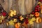 Thanksgiving background with golden pumpkin, acorn and maple lea