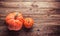 Thanksgiving background: pumpkins on wooden background. Halloween