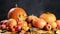 Thanksgiving Day. Table decorated with pumpkins, apple spikelets and autumn leaves. Video 4k