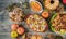 Thanksgiving dinner served with turkey, decorated with autumn leaves and pumpkin