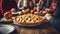 Thanksgiving family dinner. Traditional apple pie and vegan meal close up, with blurred happy people around the table