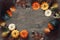 Thanksgiving and Halloween Autumn Season Holiday Background with Festive Fall Pumpkin, Leaf and Fruit Border Over Wood Texture