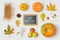 Thanksgiving holiday objects for mock up template design. Autumn pumpkin and fall leaves. View from above.