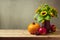 Thanksgiving holiday table decoration with sunflowers, pumpkin and apples