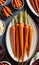 Thanksgiving Maple-Glazed Carrots On A Serving Plat. Generative AI