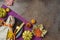 Thanksgiving party concept with plate, pumpkin and autumn leaves on dark background. Top view, flat lay