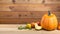 A Thanksgiving Table with Pumpkins, Pears, and Vegetables.