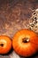 Thanksgiving table setting with orange pumpkin. Seasonal cutlery