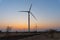 Thar desert, Rajasthan, India - 15.10.2019 : Pre dawn light in desert sky with Electrical power generating wind mills producing