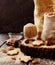 Thatched brown sugar in a cup, wooden background, selective focus