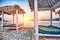 Thatched canopies and awnings on the beach Copacabana at sunset in Dubrovnik