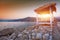 Thatched canopies and awnings on the beach Copacabana at sunset in Dubrovnik