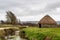Thatched circular linhay barn on Braunton Marshes near Barnstaple, Devon, England.