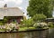 Thatched farmhouse near canal