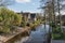 Thatched farms on a canal in fairytale village Giethoorn, Venice of the Netherlands