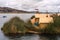 Thatched home on Floating Islands on Lake Titicaca, Peru