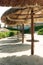 Thatched hut on a stretch of beach overlooking the Caribbean Sea