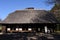 A thatched-roof dwelling of a wealthy farmer.