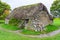 Thatched roofed Leanach Cottage at the Culloden Battlefield in Scotland