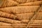 Thatched straw roof. Beach umbrella close up view.