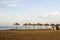 Thatched sunshades in a beach