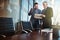 Thats amazing. two businessmen looking over some paperwork in an office.