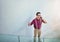 Thats great. High angle shot of a handsome young designer talking on his cellphone in the office.