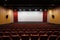 theater auditorium with rows of vacant seats