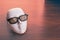 Theater mask in glasses