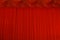 Theater stage red curtains or cinema drapes.