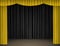 Theater stage with yellow and black curtains