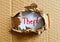 Theft concept. Hole in a cardboard of a box.