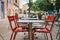 Theme cafes and restaurants. Exterior summer terrace of bright colors of street cafe shop in Europe in France. Preserved tables Wi