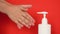 The theme of hygiene and washing of children`s hands. Close-up of an adult`s hands helping to clean the toddler`s hands with an an